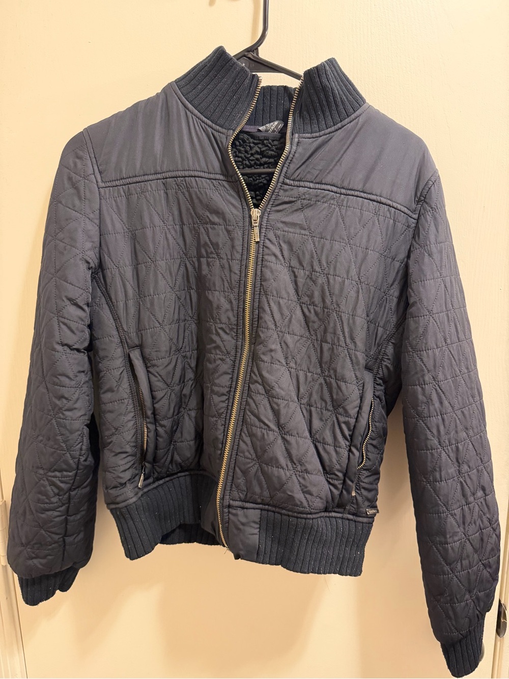 Prana Quilted blacks Jacket with Rib Trim and Sherpa lining . Size small